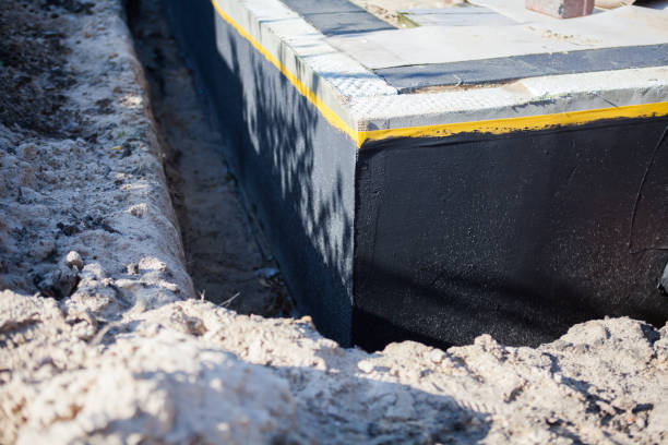 Professional Basement Waterproofing technician working in Chanhassen, MN
